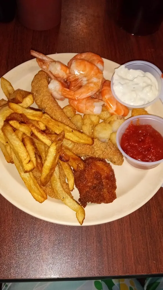 Seafood Buffet Cat Fish Fries Shrimp Cocktail and Hush Puppy